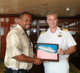 benoit_bardouille_receives_plaque_from_ship_captain__jan_2008.jpg
